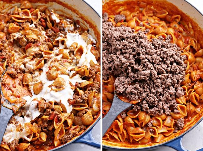 Partially cooked pasta in a skillet.