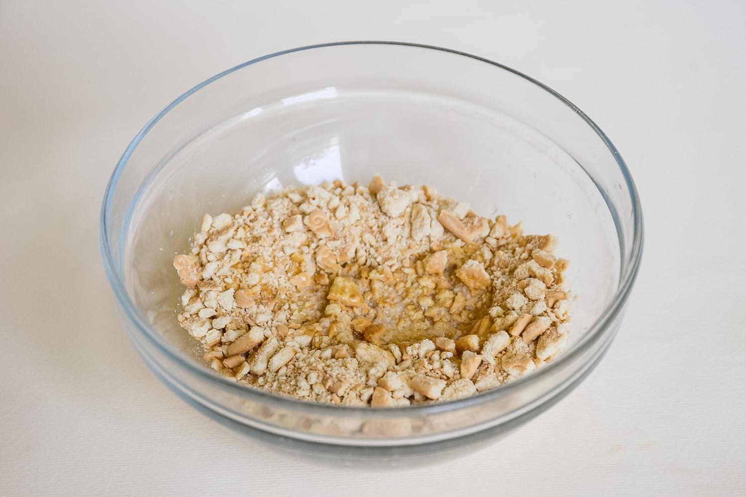 crushed graham crackers in a clear bowl