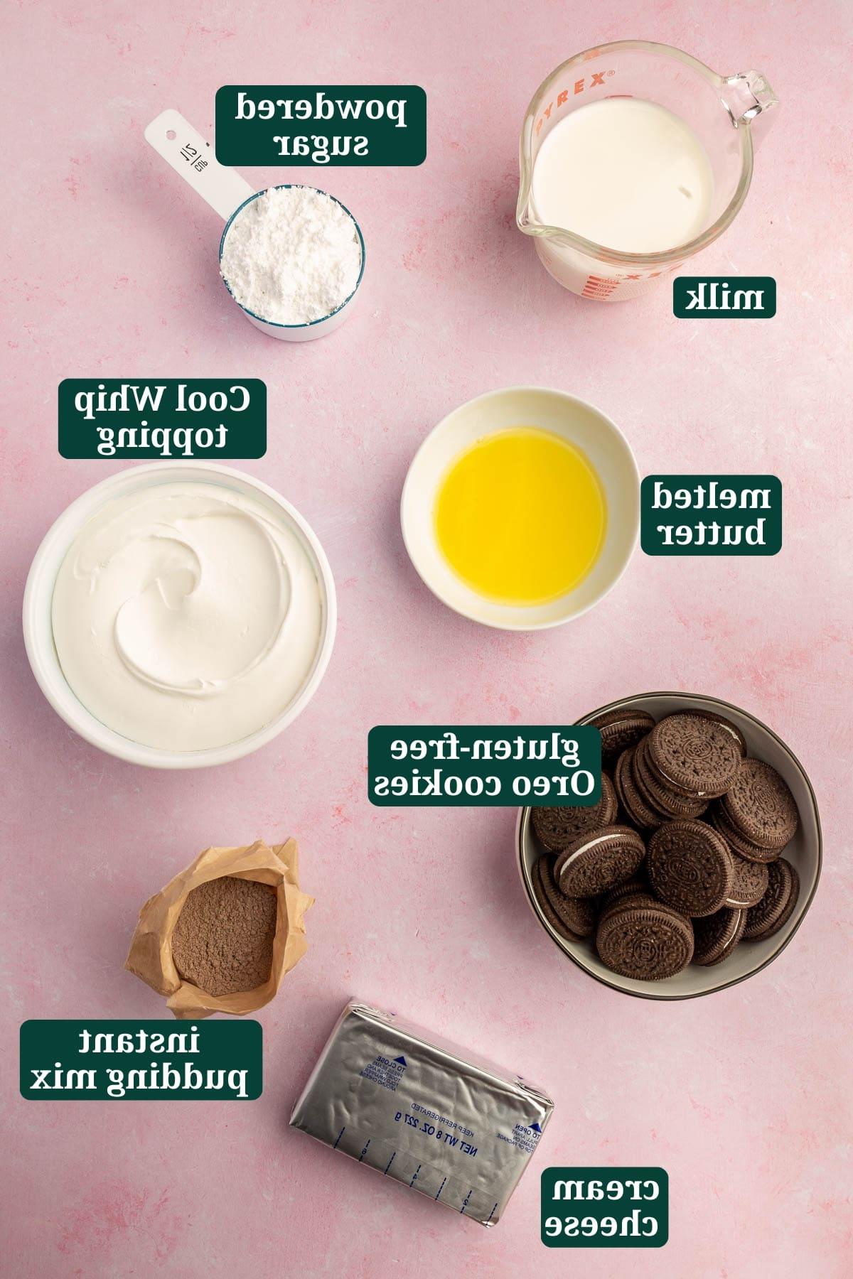 Ingredients in bowls to make gluten-free Oreo pudding pie, including milk, powdered sugar, melted butter, Cool Whip topping, gluten-free Oreo cookies, instant pudding mix, and cream cheese with text overlays over each ingredient.
