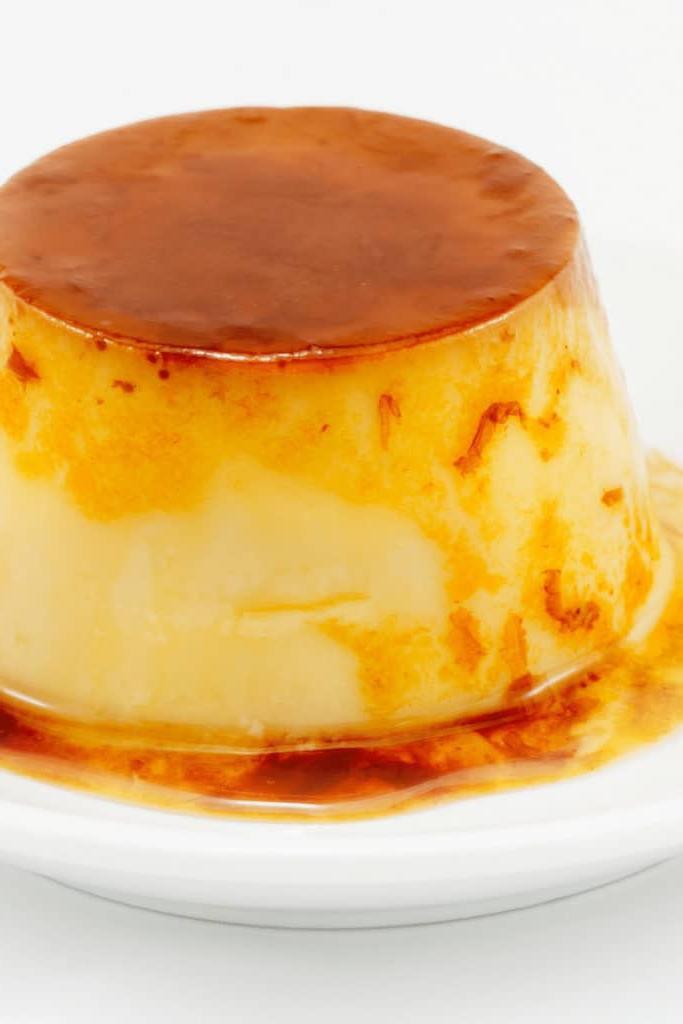 If flan is undercooked cook it for another 10-15min and increase the temperature by 50°F