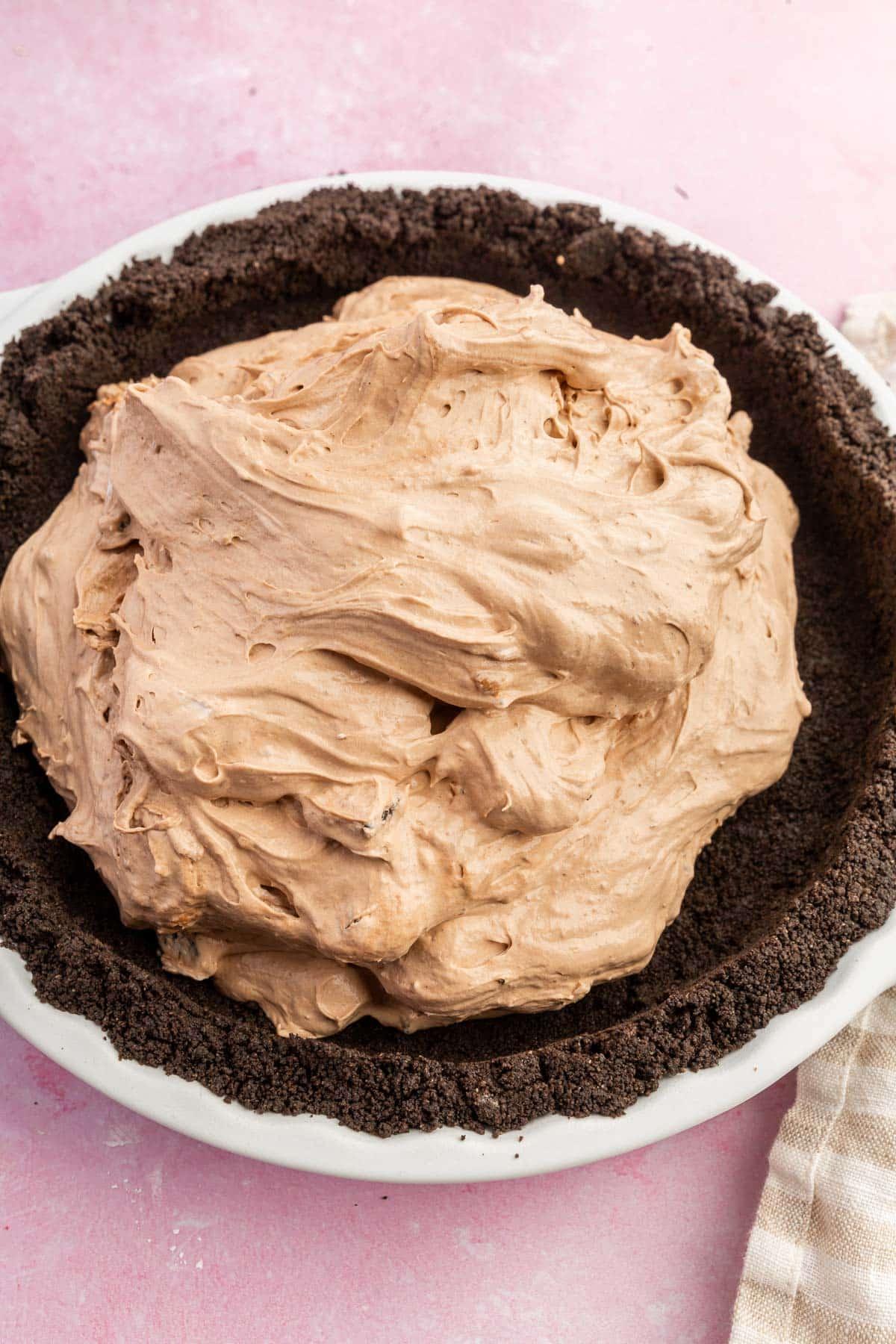 A chocolate whipped pudding mixture in an Oreo pie crust.
