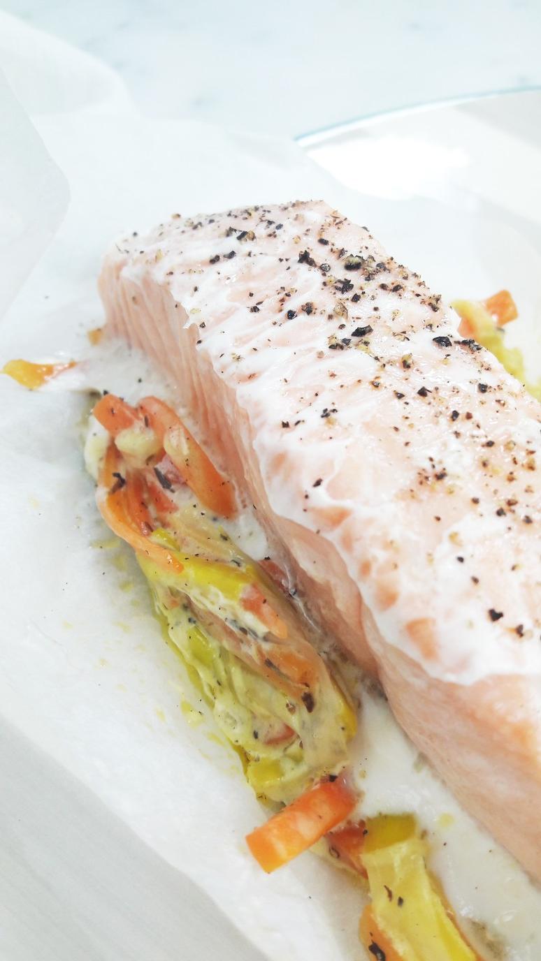 salmon leeks and carrots baked in parchment paper! Preparing salmon in parchment paper cooks it perfectly every time. | ahedgehoginthekitchen.com