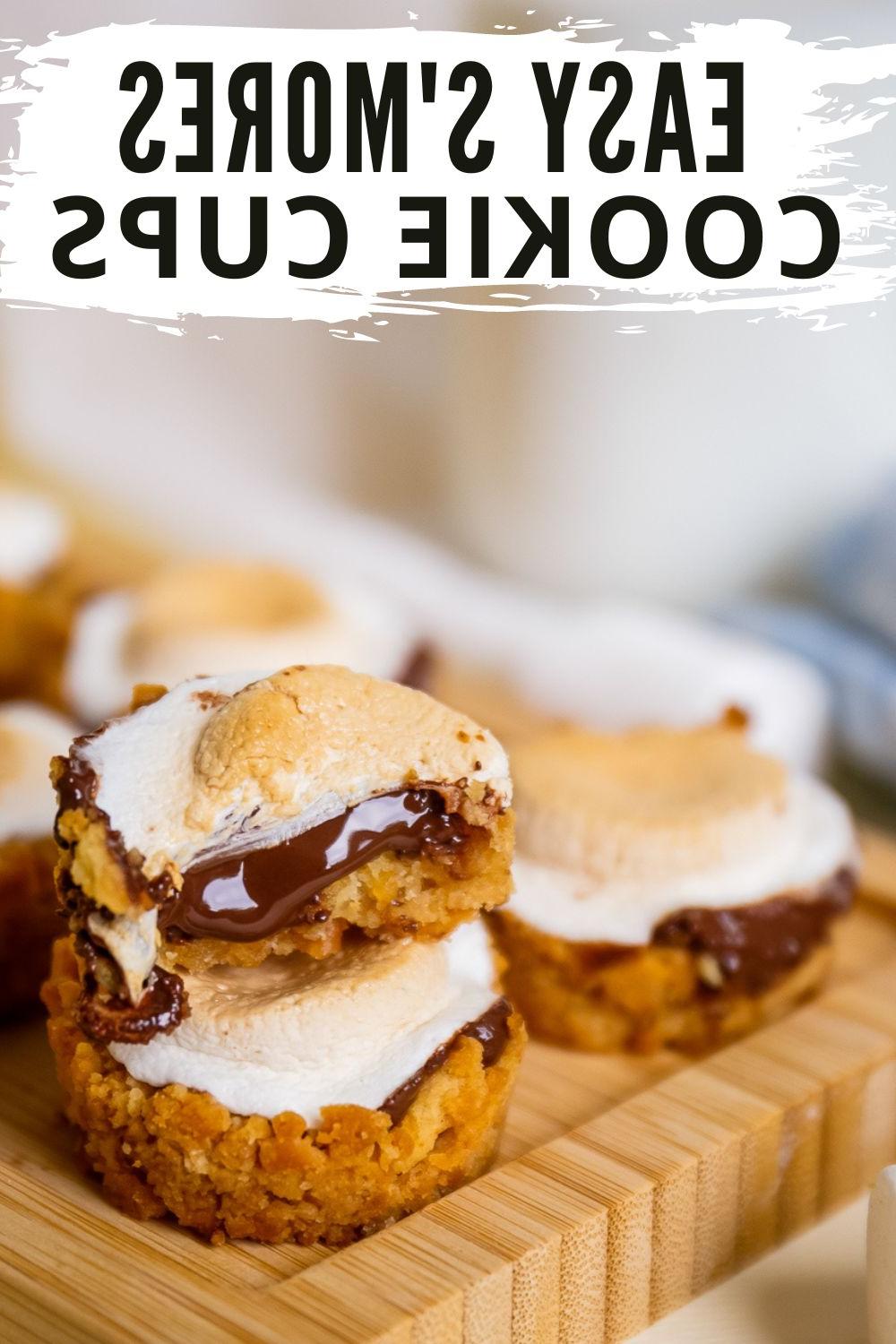 s'mores cups on a cutting board out of the oven