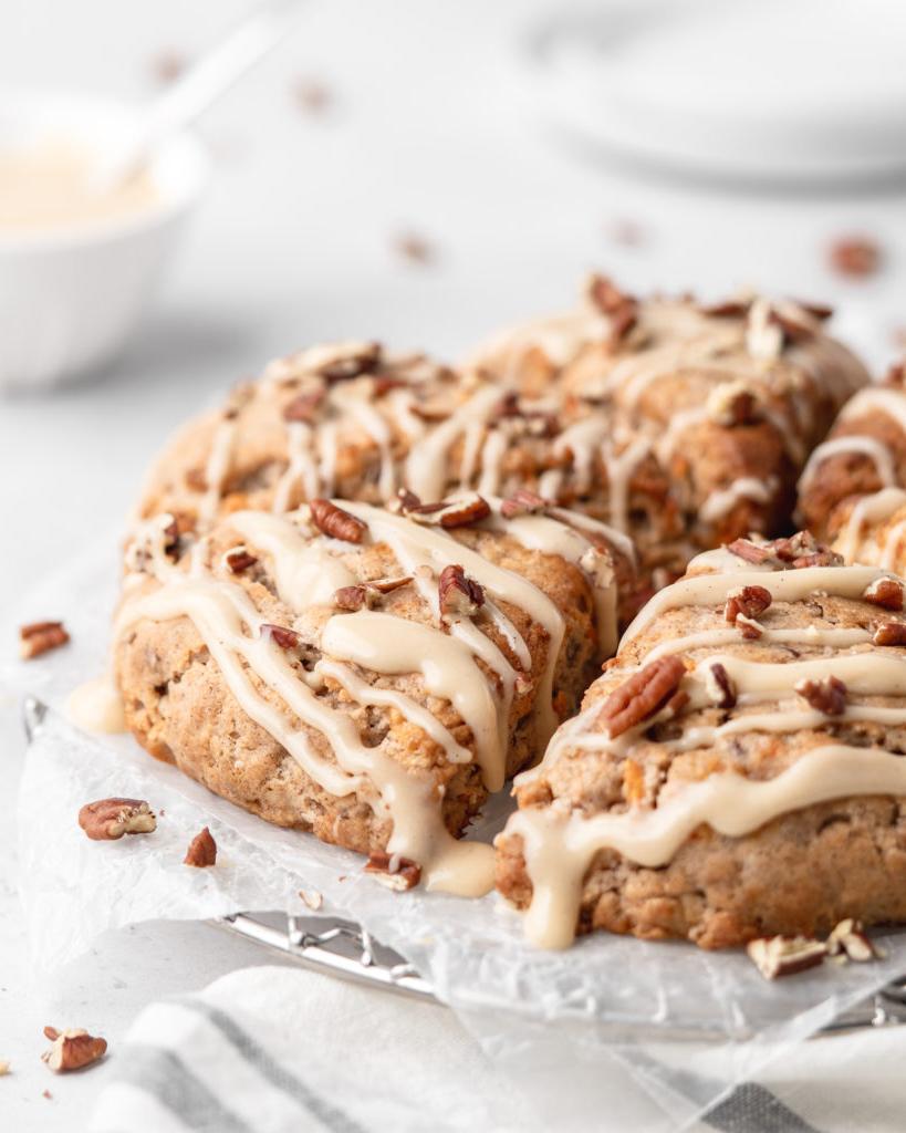 These carrot cake cones are sweet, heart warming, and delicious! With pecans and maple cream cheese glaze