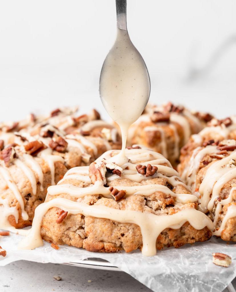 These carrot cake cones are sweet, heart warming, and delicious! With pecans and maple cream cheese glaze