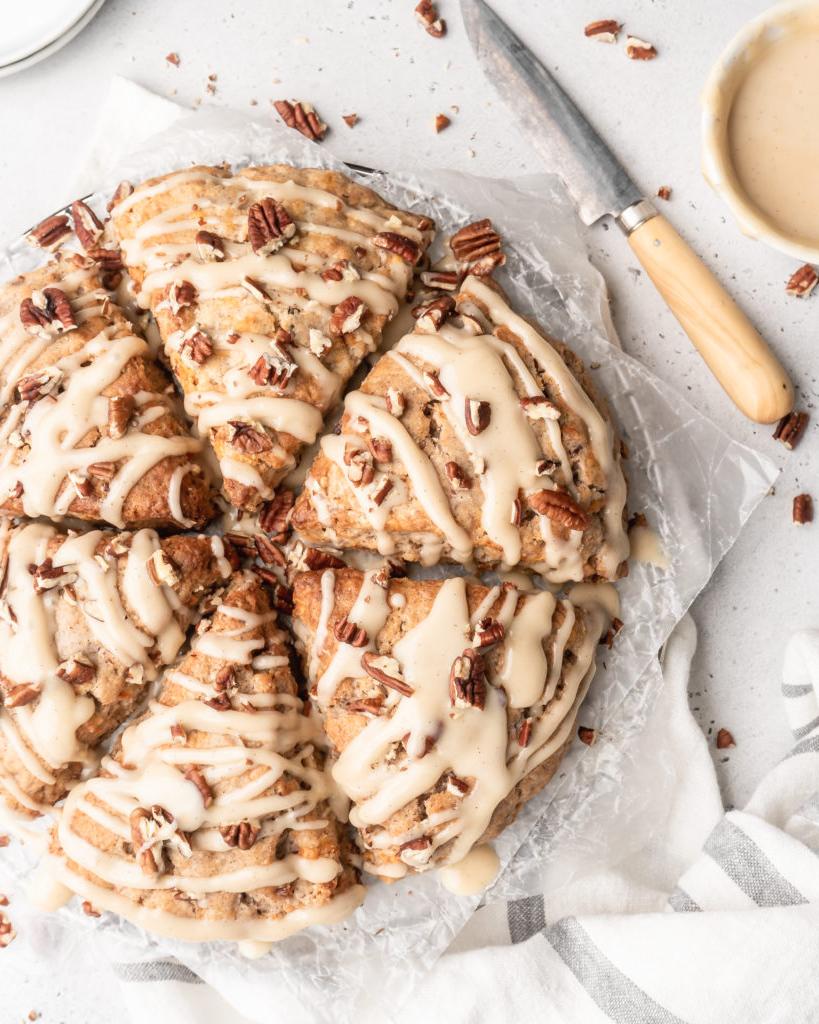 These carrot cake cones are sweet, heart warming, and delicious! With pecans and maple cream cheese glaze