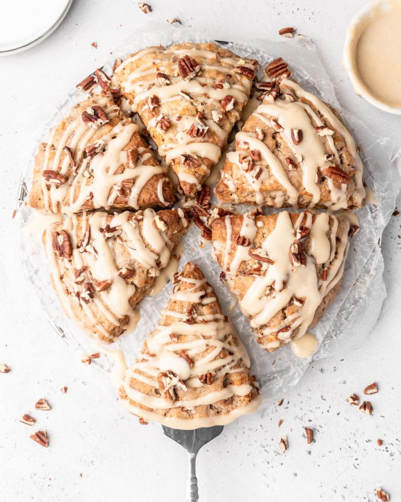 These carrot cake cones are sweet, heart warming, and delicious! With pecans and maple cream cheese glaze