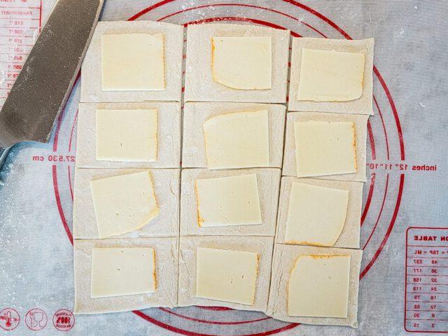 Optional step: add a slice of cheese to each square.